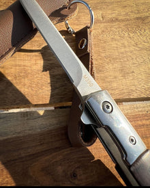 M390 Folding Knife with Brown Leather Sheath